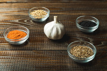 garlic lies on a wooden background