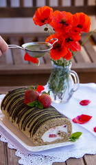 swiss roll with tea matcha and strawberry cream 