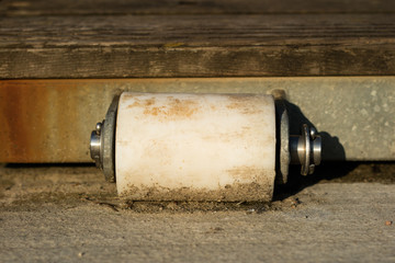 The construction is used at jetties and marinas at the lake. Plastic roller as dilatation with the...