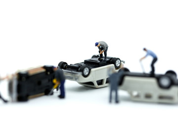 Miniature people :  Technician auto mechanic in garage,Car repairing ,Repair service