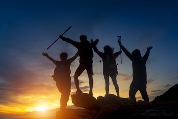 Fototapeta na wymiar Silhouette of a group people to the mountain