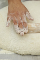 Rolling out bread dough 