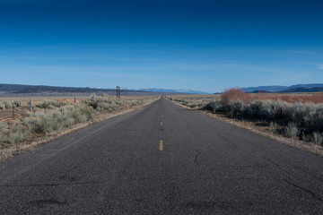 Standing in the MIddle of Desert Road and Blue Sky