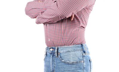 Man in jeans and shirt is standing  on white background