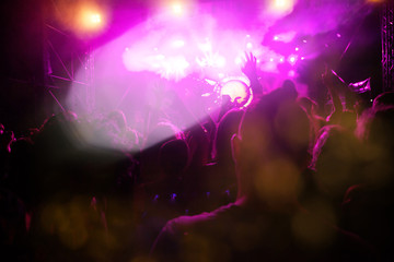 crowd with raised hands at concert - summer music festival