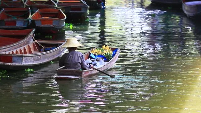sailing boat in dumneon saduak floating market ratchaburi thailand