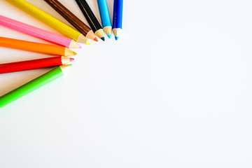 Color pencils isolated on white background. Close up. Copy Space.