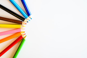 Fototapeta premium Color pencils isolated on white background. Close up. Copy Space.