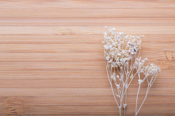 Wood table and Dried  flowers background
