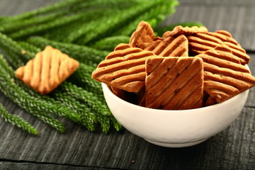 Bowl of delicious chocolate chip cookies .