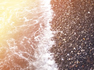 Waves and stones on a seashore   