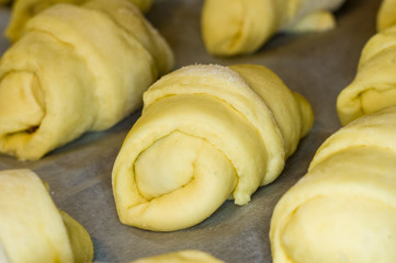 raw homemade croissants with sweet filling
