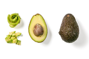 Slices of avocado on white background. Whole and half with leaves. Design element for product label