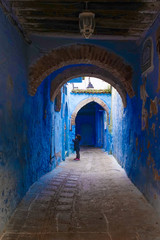 Fototapeta na wymiar Chefchaouen, Morocco. March 25, 2017. Walking Around Old Medina, Chefchaouen, Blue City of northwest Morocco