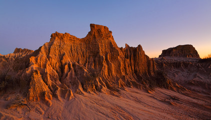 Fototapeta na wymiar Sculpted landforms in the desert