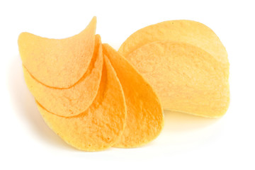 Fototapeta na wymiar heap of potato chips on white background close-up