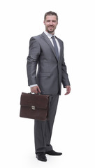 in full growth.businessman with a briefcase.