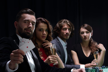 celebrating victory in poker with champagne.