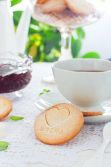 Homemade shortbread cookie with the inscription in Russian 