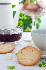 Homemade shortbread cookie with the inscription in Russian 