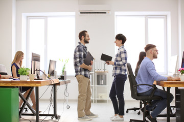 Young people working in office. Finance trading