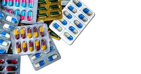 Fototapeta na wymiar Colorful of antibiotic capsule pills in blister pack isolated on white background with space. Medicine for infection disease. Antibiotic drug use with reasonable. Drug resistance, healthcare concept.