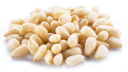 Pine nuts on the white background. Organic food.