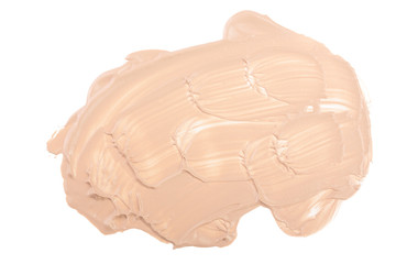 Beige liquid foundation makeup isolated on white background