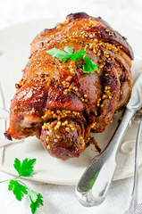 Baked roll from a turkey thigh with a grain mustard