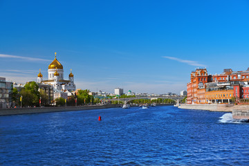 Fototapeta premium Church of Christ the Savior and Former factory building in Moscow Russia