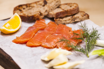 Fresh salmon sashimi salad on bamboo dish