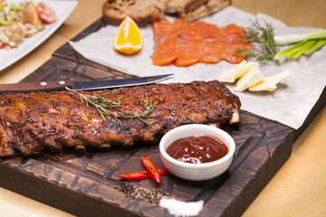 Closeup of pork ribs grilled with BBQ sauce