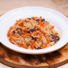 Rice pilaf with meat carrot and onion