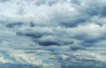 Obraz premium Gray cloud hunk formations on tropical sky , Nimbus moving , Abstract background from natural phenomenon 