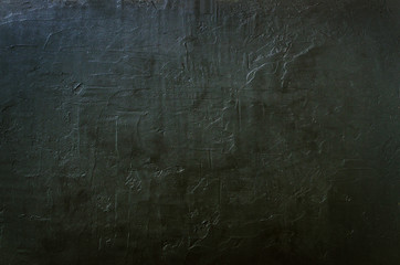 Dark concrete texture, background. Toned effect. Free space for your text.