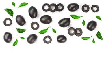 whole and sliced black olives decorated with leaves isolated on white background. Top view. Flat lay pattern