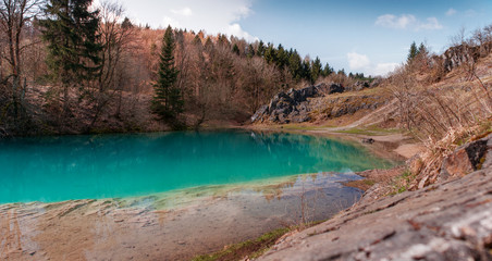 Beautiful blue mountain lake. The Blue Colour is caused by former limestone mining. (Blauer See,...