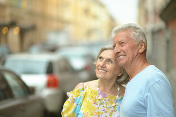 senior couple on city street