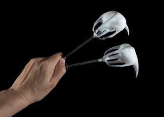 Wire whip in the hand of the cook, cooking meringue, whipping eggs with sugar