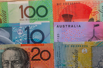 Australian dollar banknotes lied down on table, close up
