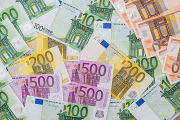 100, 200, 500 euro banknotes as background
