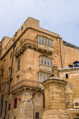 Fototapeta na wymiar Valletta, Malta. The statue of Lev Vilena at the former court building of the Order of St. John, 1760