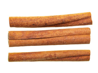 whole cinnamon on white background