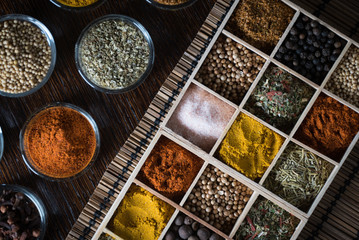 Wooden table of colorful spices