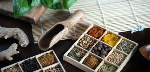 Wooden table of colorful spices