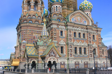 Fototapeta na wymiar Architecture of Church of Our Savior on Spilled Blood in St. Petersburg, Russia. Religious Cathedral Close Up View with Ornamental Facade Details on Sunny Day Scene. Famous City Landmark Outdoor View.