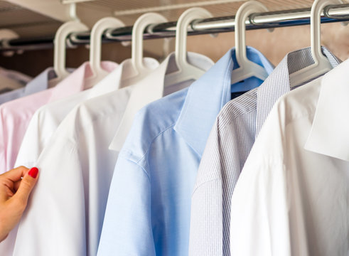 ironed shirts in the closet, selection