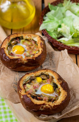 Obraz na płótnie Canvas Buns stuffed with mushrooms, ham and quail egg