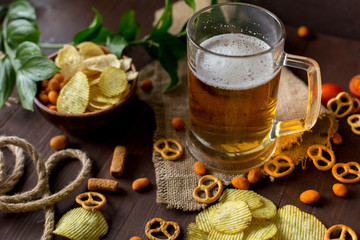 Alcoholic beer with dry snack. Weekends with friends, party