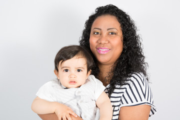 portrait smiling single mother with baby kid child mixed race with american mother